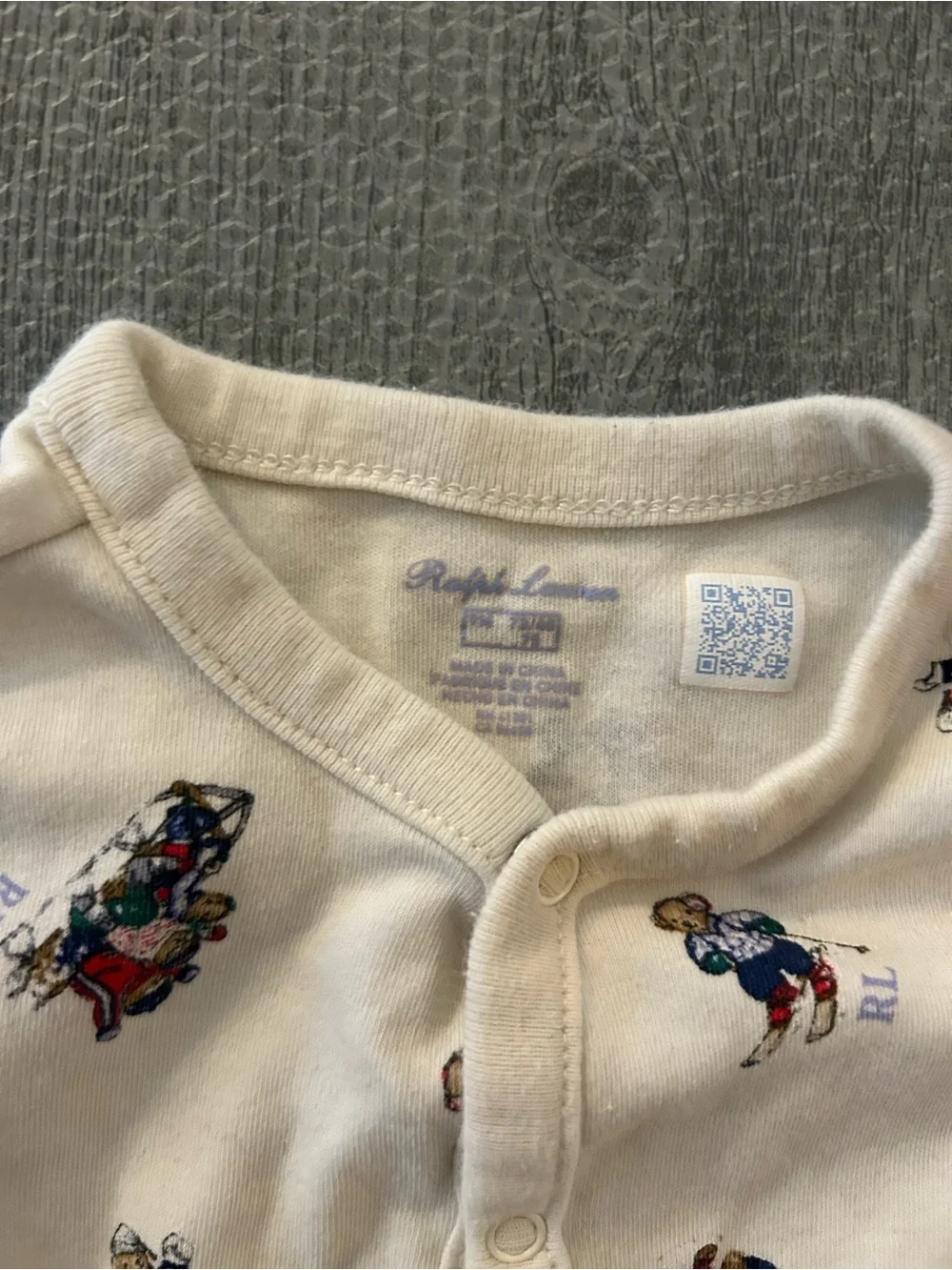 Ralph Lauren Cream Footed Baby One-Piece with Red & Blue Character Print